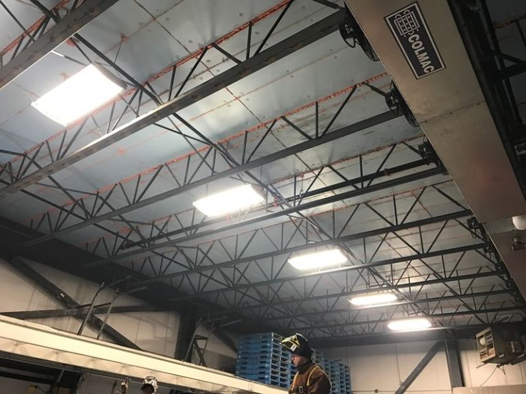 Reinforcement of an open web steel joist in an existing structure