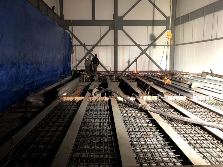 Structural steel support framing for a factory floor addition